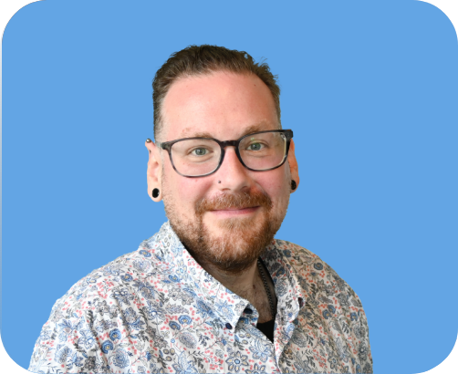 Portretfoto van Arjan, lid van de activiteitencommissie.